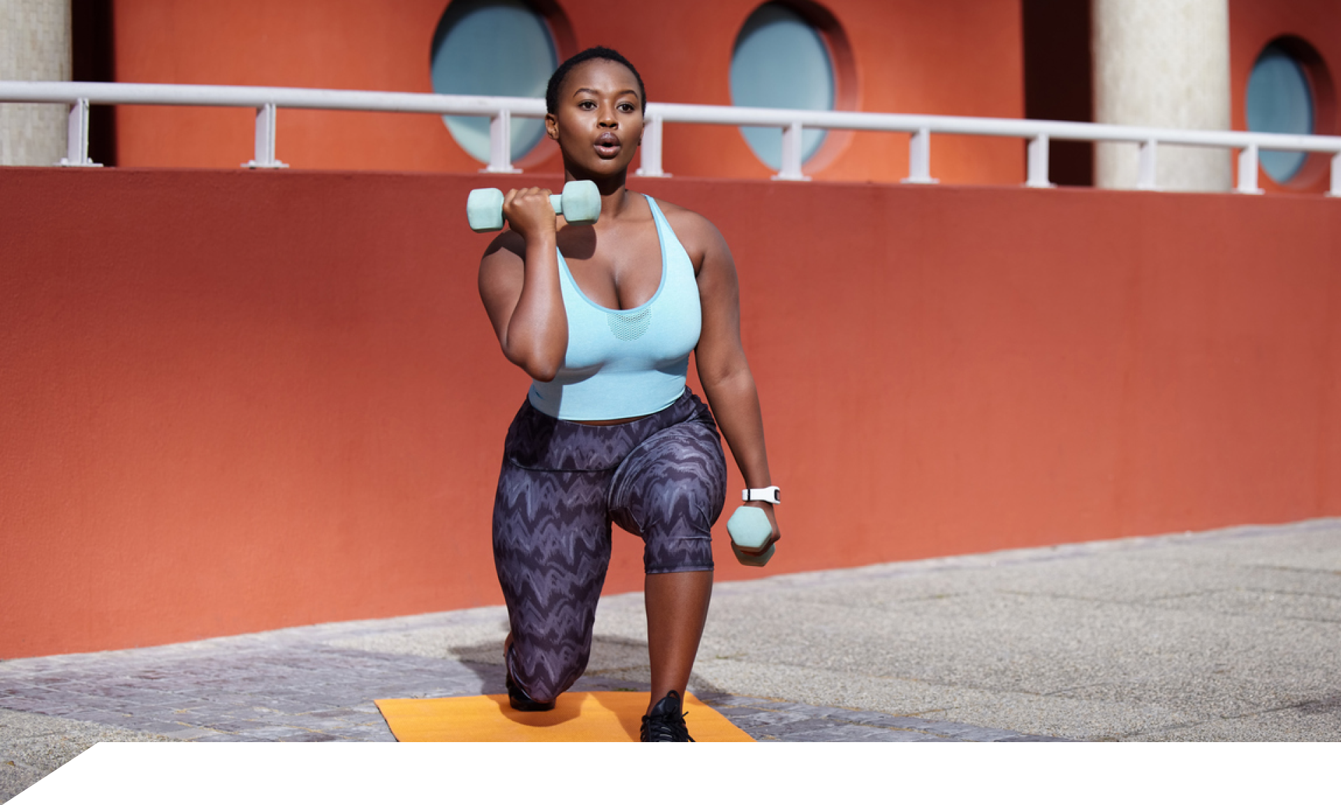 Woman doing body-weight squats at home