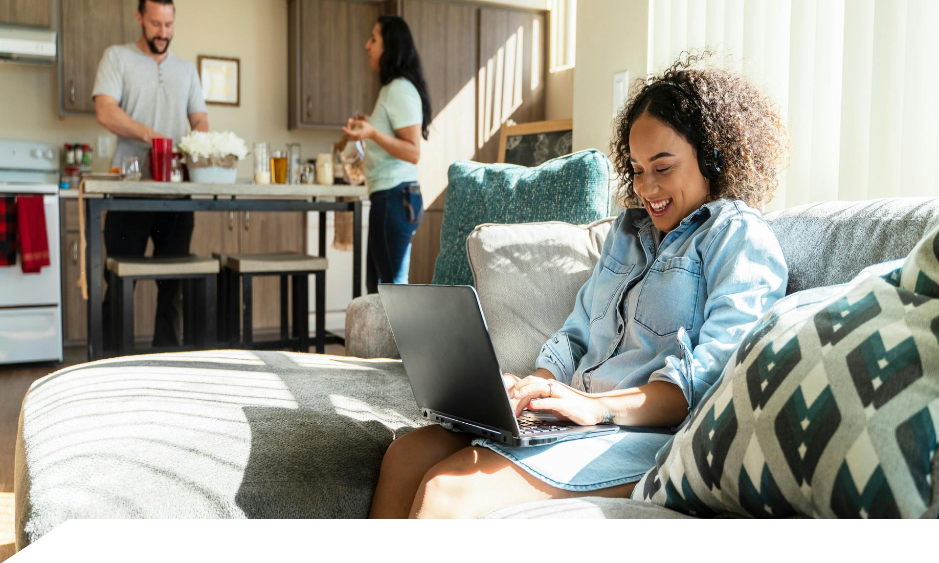 woman working on finances on couch