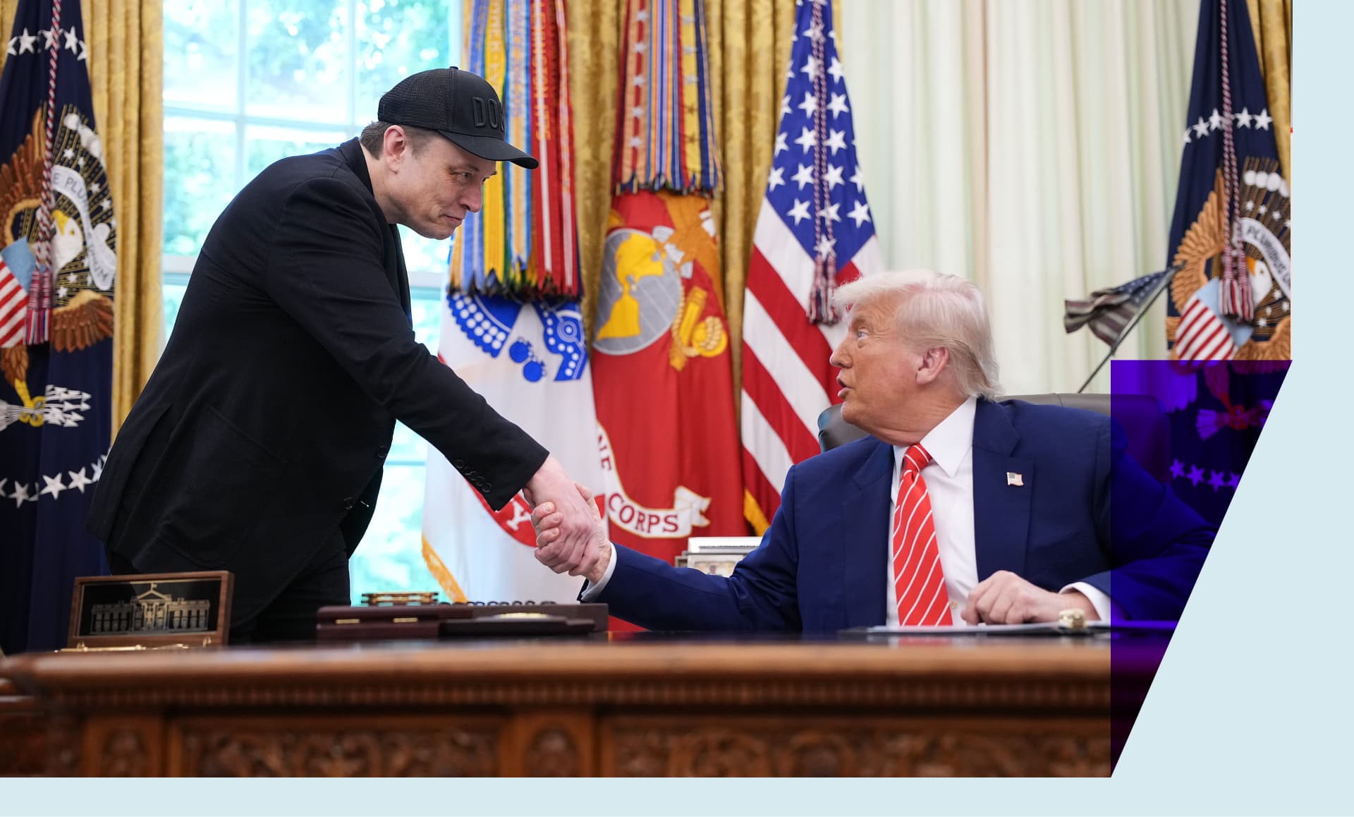 President Trump and Elon Musk sharking hands in the Oval Office