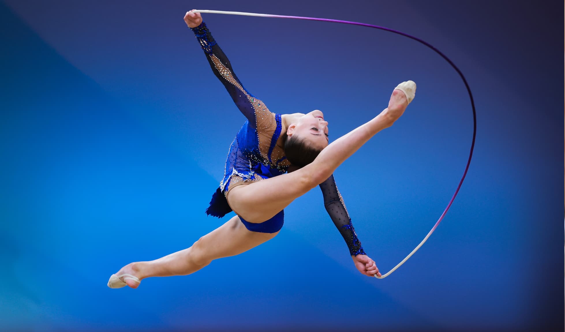 Margarita Zhurovich of Belarus competes with the hoop in the rhythmic gymnastics on day two of Sky Grace Cup Internationa Rhythmic Gymnastics Tournament at Beijing Shougang Ice Hockey Stadium on November 13, 2025 in Beijing, China.